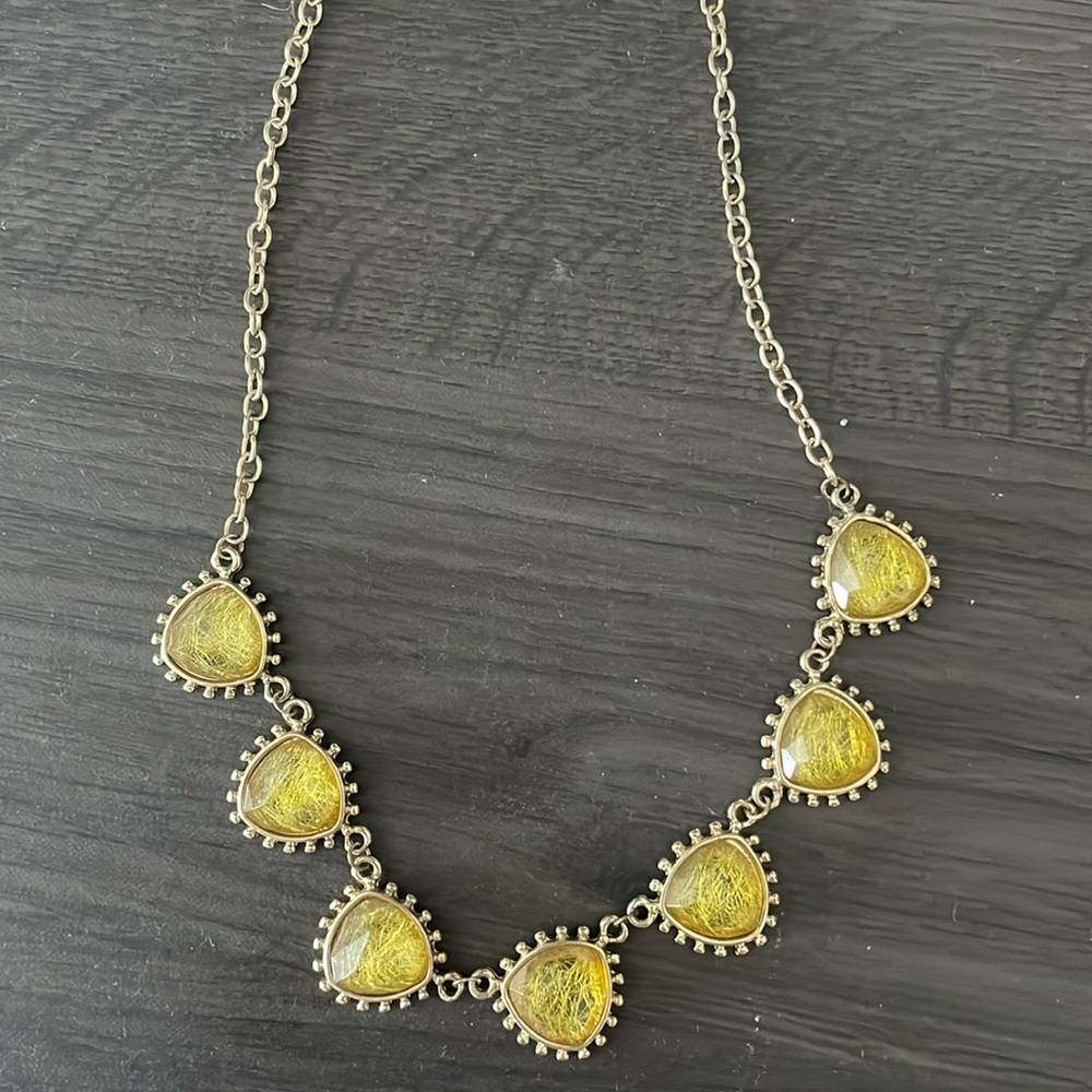 Necklace gold chain with yellow gemstones